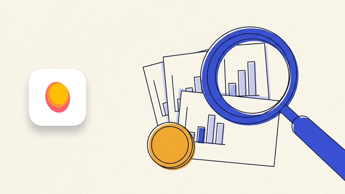 Mangools icon beside a flat illustration of a large magnifying glass with an indigo rim resting over a fanned stack of three paper index cards.